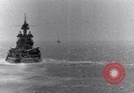 Image of US Battleships firing 5 inch and 16 inch guns Pacific Theater, 1943, second 16 stock footage video 65675027742