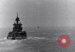 Image of US Battleships firing 5 inch and 16 inch guns Pacific Theater, 1943, second 32 stock footage video 65675027742