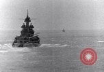 Image of US Battleships firing 5 inch and 16 inch guns Pacific Theater, 1943, second 52 stock footage video 65675027742
