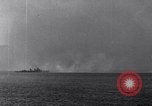 Image of US Naval gunfire supporting ground troops Okinawa Ryukyu Islands, 1945, second 32 stock footage video 65675027751