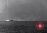 Image of US Naval gunfire supporting ground troops Okinawa Ryukyu Islands, 1945, second 34 stock footage video 65675027751