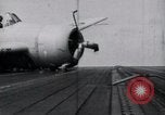 Image of F4F-3 crash landing on deck of USS Hornet Pacific Theater, 1942, second 3 stock footage video 65675027776