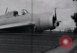 Image of F4F-3 crash landing on deck of USS Hornet Pacific Theater, 1942, second 9 stock footage video 65675027776