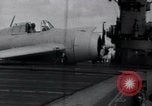 Image of F4F-3 crash landing on deck of USS Hornet Pacific Theater, 1942, second 10 stock footage video 65675027776