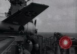 Image of F4F-3 crash landing on deck of USS Hornet Pacific Theater, 1942, second 16 stock footage video 65675027776