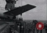 Image of F4F-3 crash landing on deck of USS Hornet Pacific Theater, 1942, second 18 stock footage video 65675027776