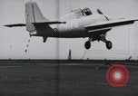 Image of F4F crash on CV-7 Pacific Theater, 1942, second 3 stock footage video 65675027778