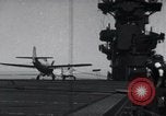 Image of F4F crash on CV-7 Pacific Theater, 1942, second 10 stock footage video 65675027778