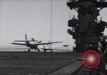 Image of F4F crash on CV-7 Pacific Theater, 1942, second 13 stock footage video 65675027778