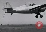 Image of F4F crash on USS Wasp CV-7 Pacific Theater, 1942, second 4 stock footage video 65675027780