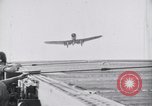 Image of SB2U crash on USS Wasp Pacific Theater, 1942, second 10 stock footage video 65675027781