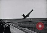 Image of SB2U crash on USS Wasp Pacific Theater, 1942, second 13 stock footage video 65675027781
