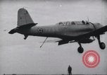 Image of SB2U crash landing on CV-7 USS Wasp Pacific Theater, 1942, second 3 stock footage video 65675027782