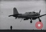 Image of SB2U crash landing on CV-7 USS Wasp Pacific Theater, 1942, second 4 stock footage video 65675027782