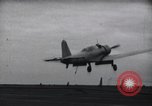 Image of SB2U crash landing on CV-7 USS Wasp Pacific Theater, 1942, second 6 stock footage video 65675027782