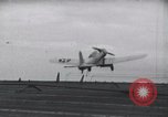 Image of SB2U crash landing on CV-7 USS Wasp Pacific Theater, 1942, second 9 stock footage video 65675027782