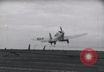 Image of SB2U crash landing on CV-7 USS Wasp Pacific Theater, 1942, second 10 stock footage video 65675027782