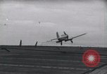 Image of SB2U crash landing on CV-7 USS Wasp Pacific Theater, 1942, second 14 stock footage video 65675027782