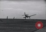 Image of SB2U crash landing on CV-7 USS Wasp Pacific Theater, 1942, second 15 stock footage video 65675027782