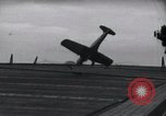 Image of SB2U crash landing on CV-7 USS Wasp Pacific Theater, 1942, second 18 stock footage video 65675027782