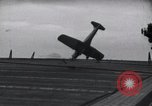 Image of SB2U crash landing on CV-7 USS Wasp Pacific Theater, 1942, second 19 stock footage video 65675027782