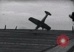 Image of SB2U crash landing on CV-7 USS Wasp Pacific Theater, 1942, second 20 stock footage video 65675027782