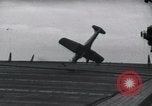 Image of SB2U crash landing on CV-7 USS Wasp Pacific Theater, 1942, second 21 stock footage video 65675027782