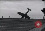 Image of SB2U crash landing on CV-7 USS Wasp Pacific Theater, 1942, second 22 stock footage video 65675027782