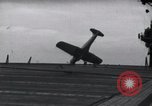 Image of SB2U crash landing on CV-7 USS Wasp Pacific Theater, 1942, second 23 stock footage video 65675027782