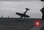 Image of SB2U crash landing on CV-7 USS Wasp Pacific Theater, 1942, second 25 stock footage video 65675027782