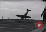Image of SB2U crash landing on CV-7 USS Wasp Pacific Theater, 1942, second 26 stock footage video 65675027782