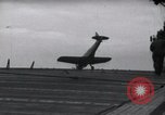Image of SB2U crash landing on CV-7 USS Wasp Pacific Theater, 1942, second 27 stock footage video 65675027782