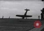 Image of SB2U crash landing on CV-7 USS Wasp Pacific Theater, 1942, second 33 stock footage video 65675027782