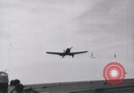 Image of SB2U landing on CV-7 USS Wasp Pacific Theater, 1942, second 3 stock footage video 65675027784
