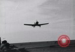 Image of SB2U landing on CV-7 USS Wasp Pacific Theater, 1942, second 4 stock footage video 65675027784