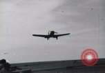 Image of SB2U landing on CV-7 USS Wasp Pacific Theater, 1942, second 5 stock footage video 65675027784