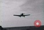 Image of SB2U landing on CV-7 USS Wasp Pacific Theater, 1942, second 6 stock footage video 65675027784