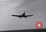 Image of SB2U landing on CV-7 USS Wasp Pacific Theater, 1942, second 9 stock footage video 65675027784