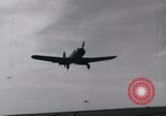 Image of SB2U landing on CV-7 USS Wasp Pacific Theater, 1942, second 10 stock footage video 65675027784