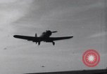 Image of SB2U landing on CV-7 USS Wasp Pacific Theater, 1942, second 11 stock footage video 65675027784