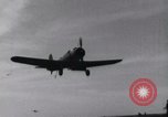 Image of SB2U landing on CV-7 USS Wasp Pacific Theater, 1942, second 13 stock footage video 65675027784