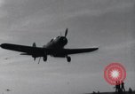 Image of SB2U landing on CV-7 USS Wasp Pacific Theater, 1942, second 14 stock footage video 65675027784