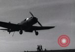 Image of SB2U landing on CV-7 USS Wasp Pacific Theater, 1942, second 16 stock footage video 65675027784