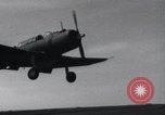 Image of SB2U landing on CV-7 USS Wasp Pacific Theater, 1942, second 18 stock footage video 65675027784