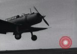 Image of SB2U landing on CV-7 USS Wasp Pacific Theater, 1942, second 19 stock footage video 65675027784