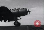 Image of SB2U landing on CV-7 USS Wasp Pacific Theater, 1942, second 21 stock footage video 65675027784