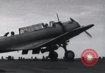 Image of SB2U landing on CV-7 USS Wasp Pacific Theater, 1942, second 23 stock footage video 65675027784