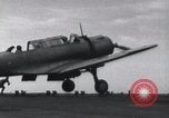 Image of SB2U landing on CV-7 USS Wasp Pacific Theater, 1942, second 24 stock footage video 65675027784