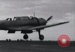 Image of SB2U landing on CV-7 USS Wasp Pacific Theater, 1942, second 25 stock footage video 65675027784