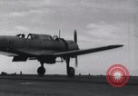 Image of SB2U landing on CV-7 USS Wasp Pacific Theater, 1942, second 26 stock footage video 65675027784